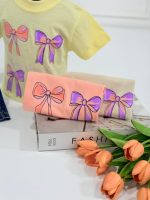 کد ۳۷۴۴ تیشرت پاپیون + شلوارک جین آبی - Image 5